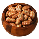 جوز بيكان مغطى بالشوكولاتة البيضاء والكراميل